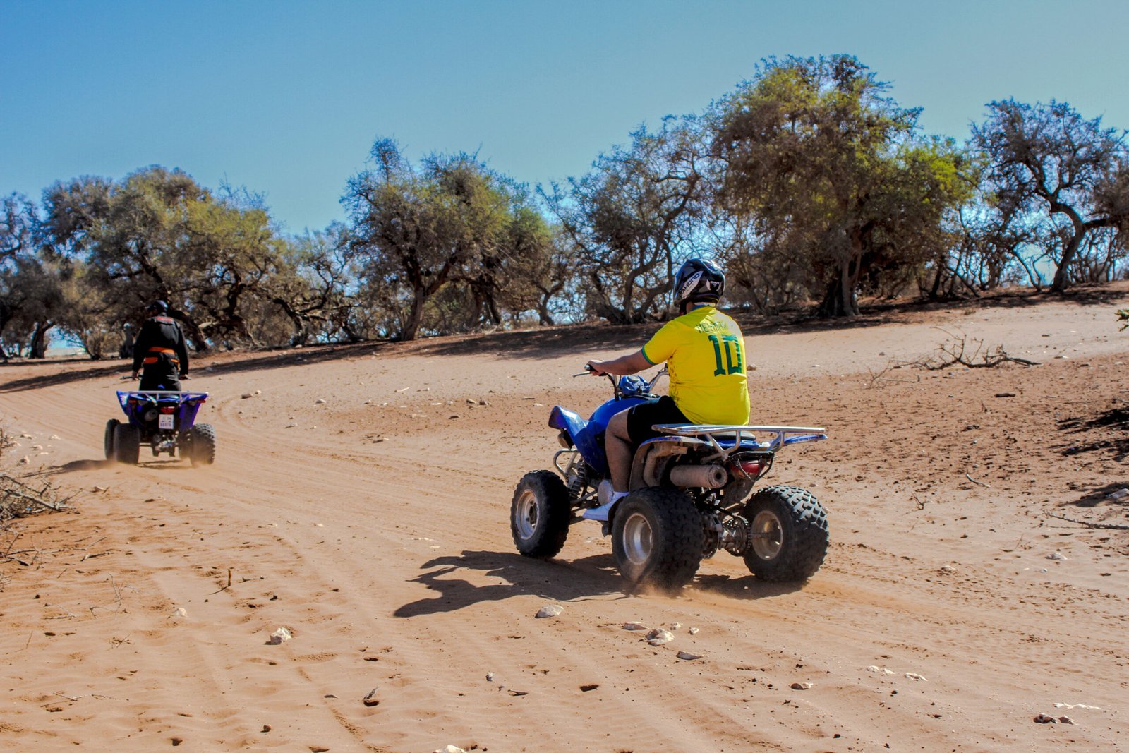 Private Quad Biking Agadir tour guide and rider in the dunes